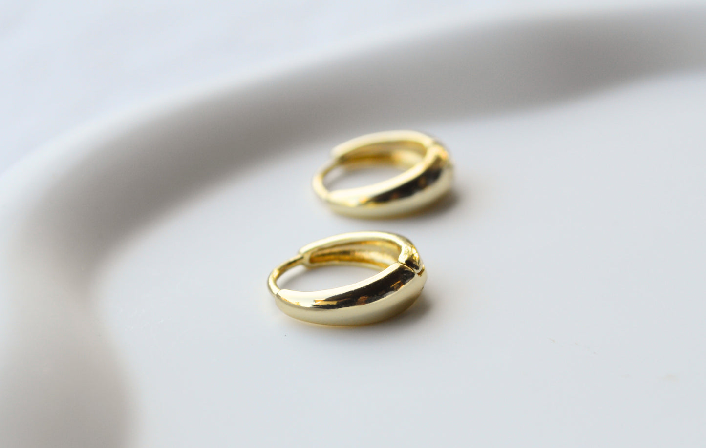 Wide hoop earrings