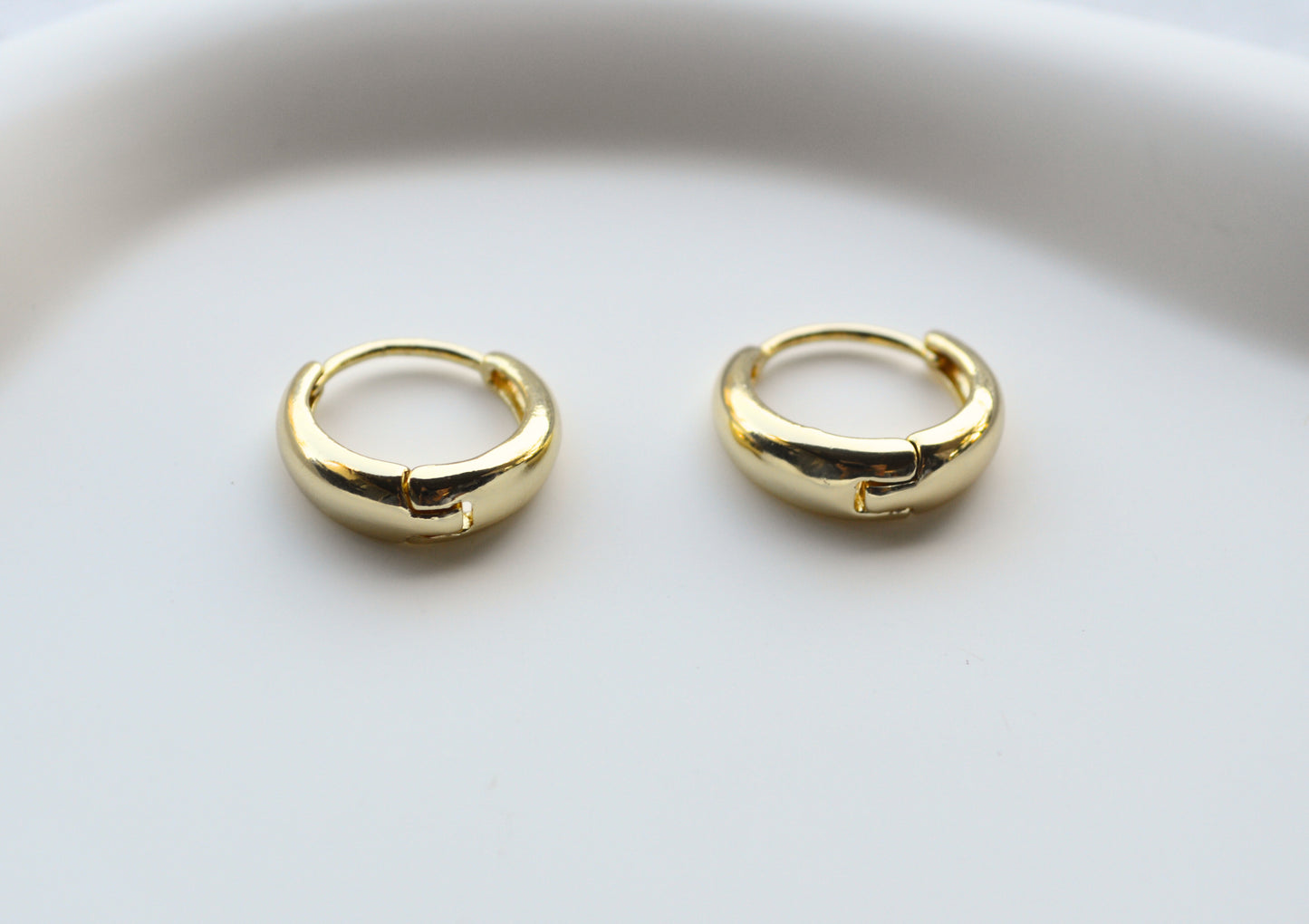 Wide hoop earrings